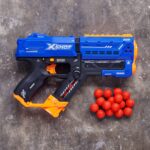 PISTOLA LANZA DARDOS XSHOT CHAOS*12